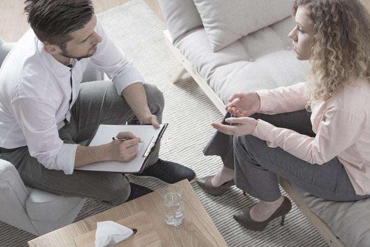 Woman consulting divorce with lawyer