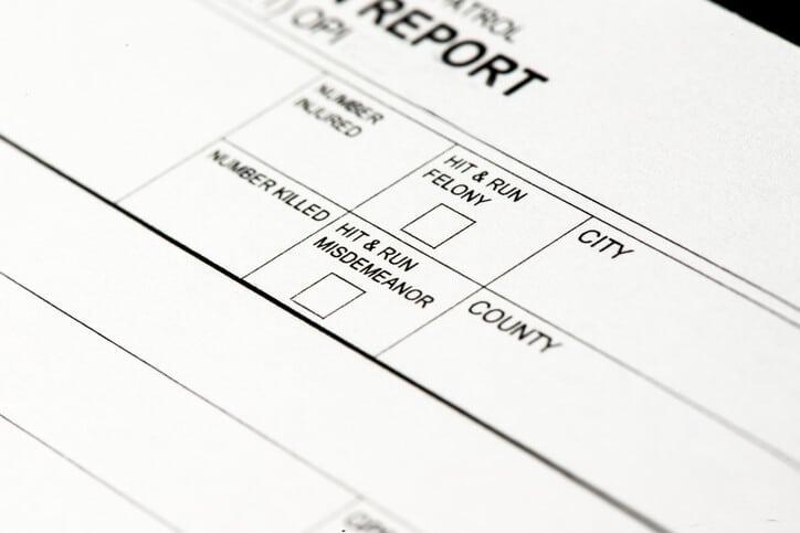 A close up of a traffic collision report. This portion of the report has boxes indicating if there was a hit and run involved.